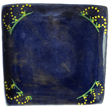 Pottery design with blue background with yellow mimosa/cornflower design.
