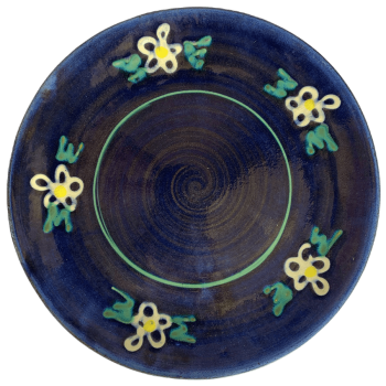 Pottery pattern with blue background with white daisy flowers.