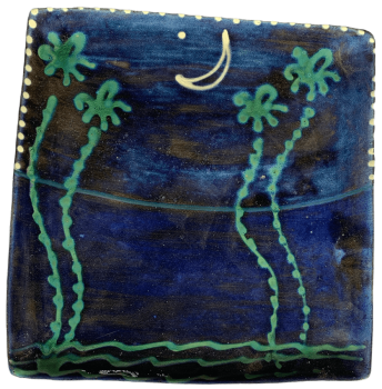 Square pottery design with deep blue background with moon and stars.