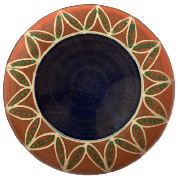 Round pottery pattern with blue inner band, watermelon outer band with white pods and green seeds.