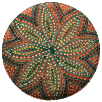 Pottery design with watermelon background with a starburst of colorful crescents and dots.