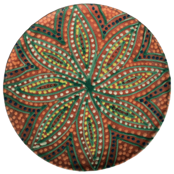 Pottery design with watermelon background with a starburst of colorful crescents and dots.