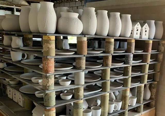 Pottery going into the kiln