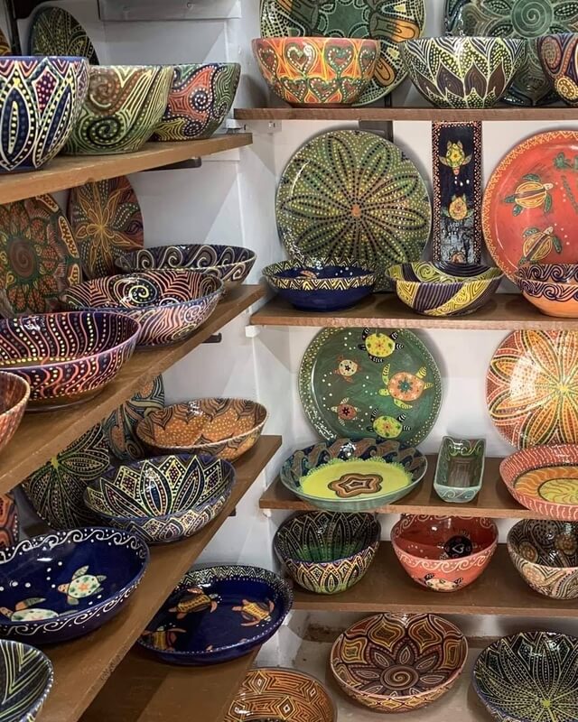 Caribbean pottery on shelves