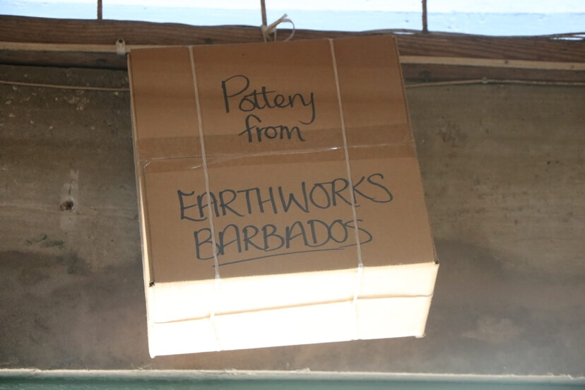 Earthworks Pottery packed in a box