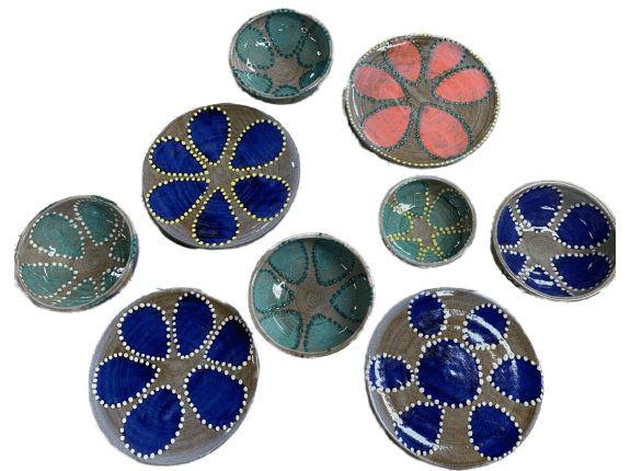 A selection of petal themed custom pottery dinner set